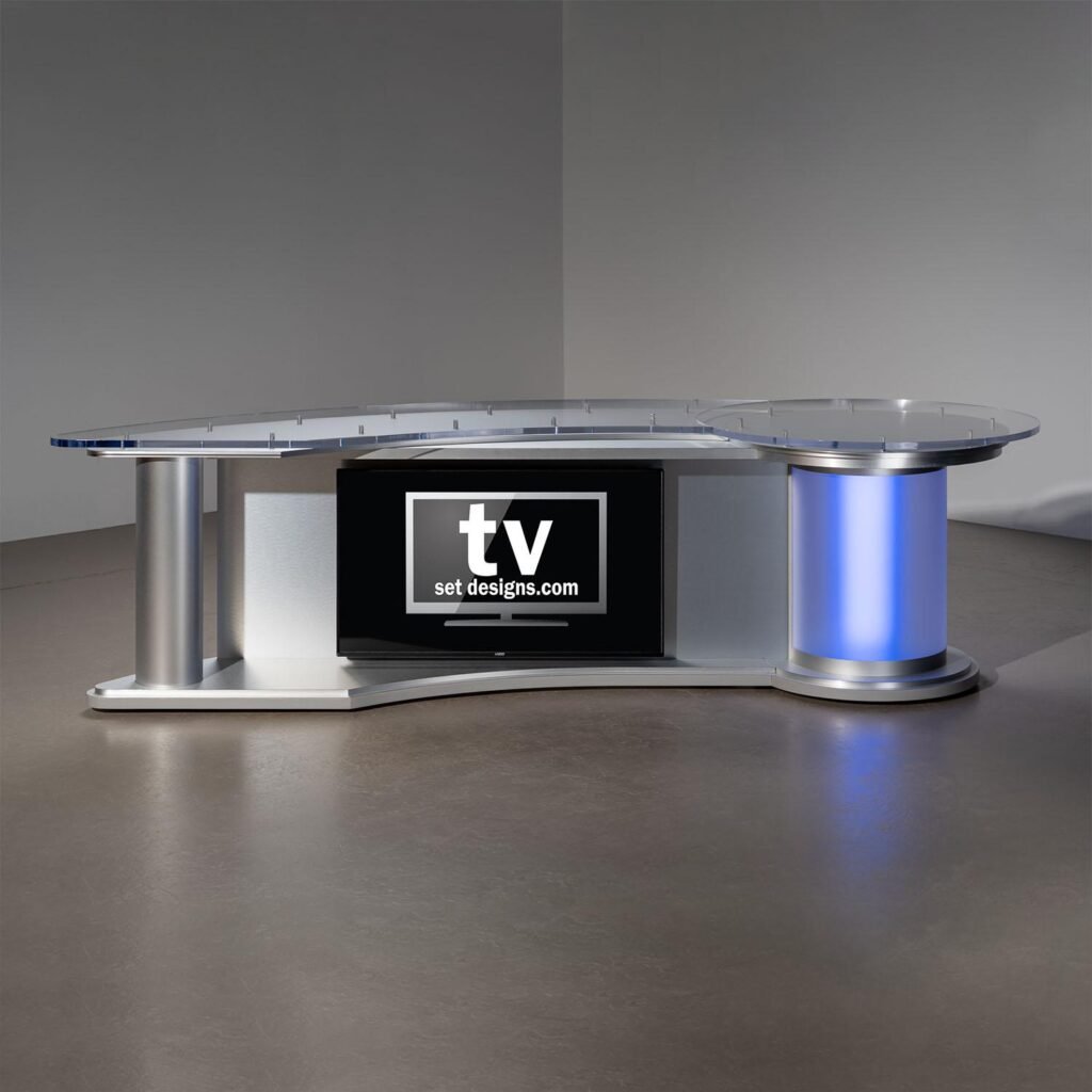 Contemporary television news studio anchor desk with glass top, metallic frame, and integrated monitor display for reporting on latest international news and breaking world news updates